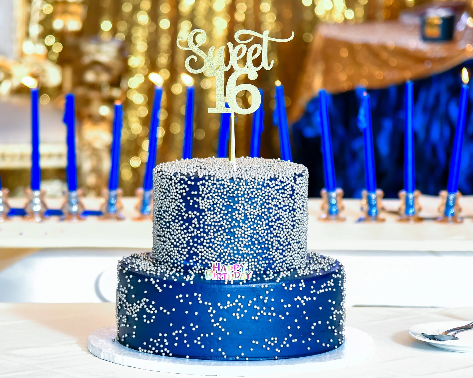 Blue Sweet 16 cake with silver beads