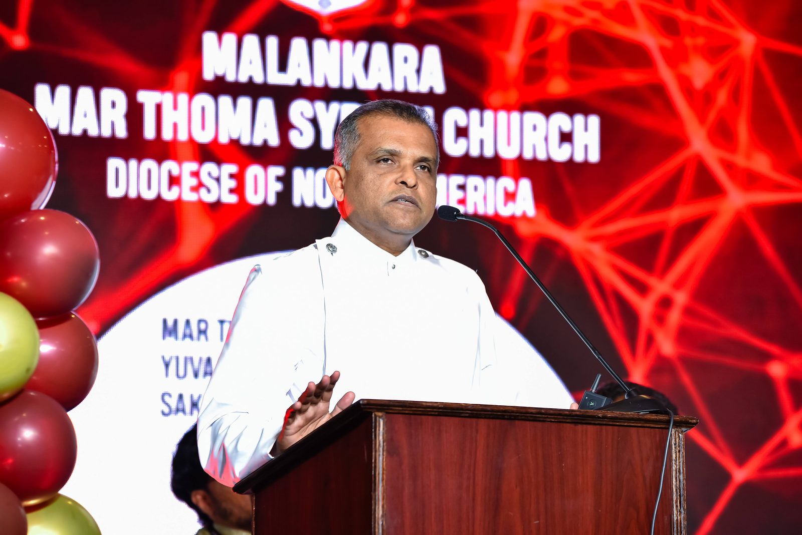 Speaker at a podium during a church diocese event