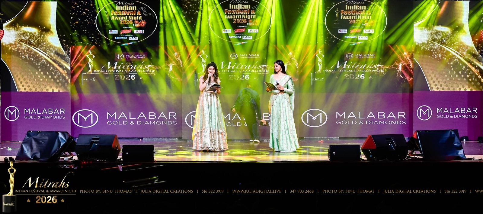 Two hosts on stage at an Indian festival and award night