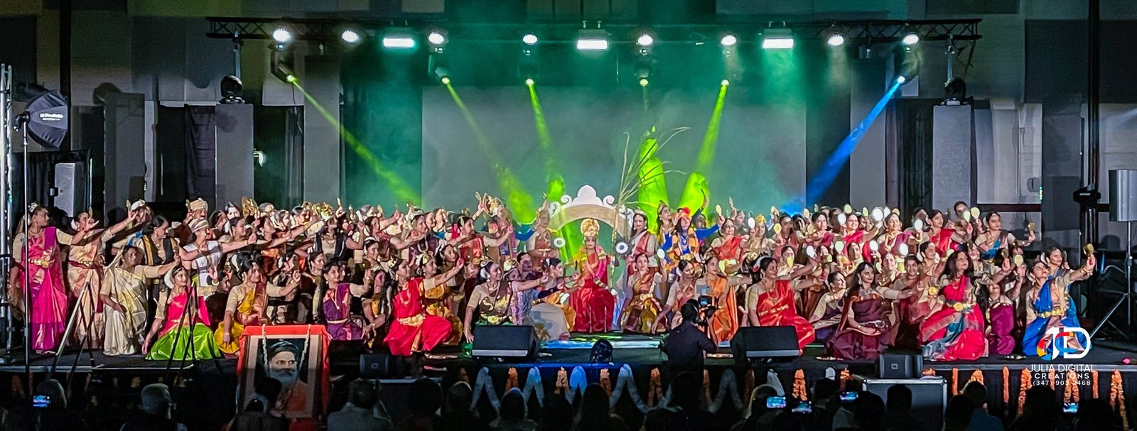 Large group performance on a lit stage