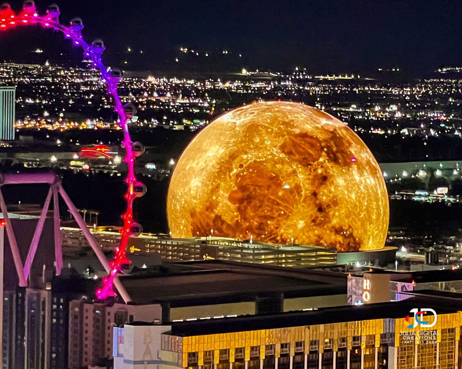 The Las Vegas Sphere and High Roller wheel at night