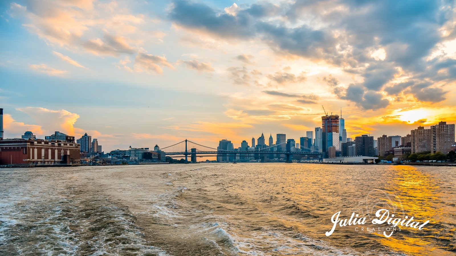 Manhattan skyline at sunset from the water